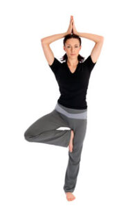 woman doing yoga for life balance coaching