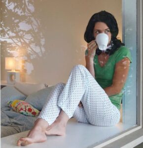 relaxed mom in organized bedroom