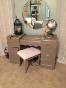 Fortunately, I still loved most of the furniture in my bedroom. They just needed refreshing. For example, my vanity table was a cream color and didn’t have a coat of poly on top. Over the years of putting on makeup there, it was looking grungy. A darker color would do better for a makeup space and hide smudges. So, I simply (I mean painstakingly) painted each piece of furniture with chalk paint and updated the hardware.