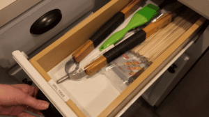 Organized BBQ grill drawer with label