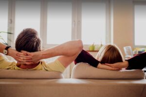 couple relaxing on couch