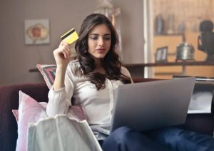 woman shopping on laptop/online resulting in clutter