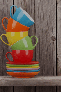 stacked mugs and plates