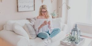 woman sitting on couch