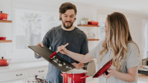 couple cooking together in an organized kitchen