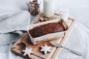 Holiday bread, star cookies and milk