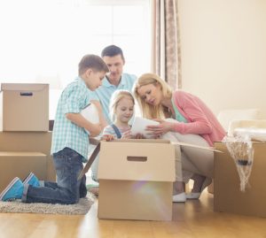 Family packing a box