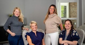 Team photo of professional organizers with home organizing company in St. Louis