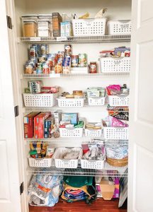 Kitchen pantry organized with containers by best home organizers in St. Louis
